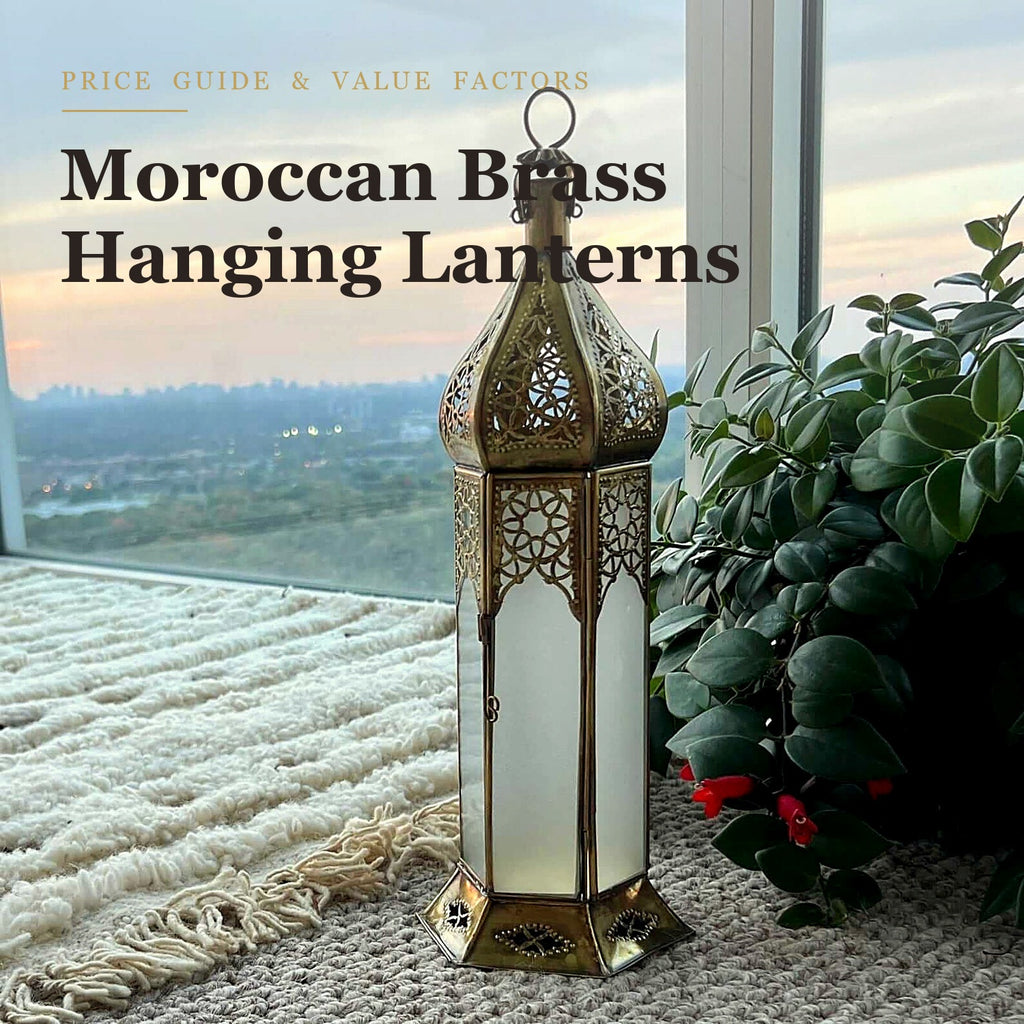 Moroccan brass hanging lantern with a pierced candle holder displayed by a sunlit window
