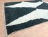Handmade Beniourain Wool Rug – Timeless Black & White Moroccan Elegance