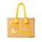 Handwoven Moroccan wicker beach tote with yellow braided handles and Easy Peasy Lemon Squeezy embroidered lemon design summer bag