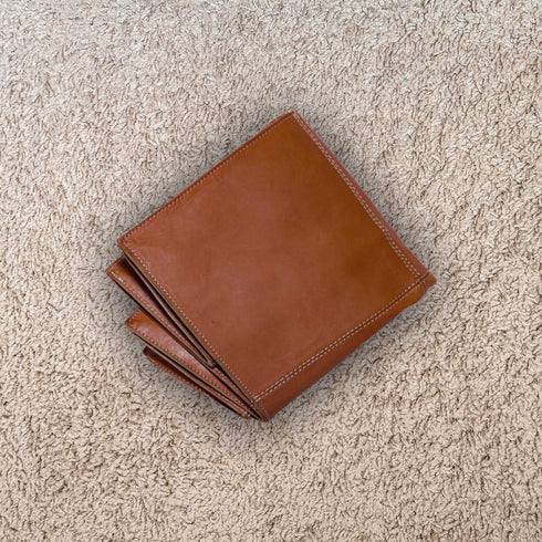 Handcrafted Moroccan Leather Pouf Ottoman - Elegant & Versatile Décor