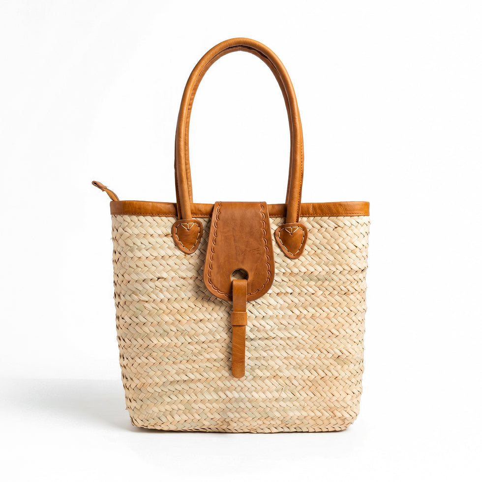Natural woven Moroccan handbag with premium leather handles perfect for beach vacations and picnics