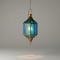 Illuminate your sanctuary with the enchanting glow of a Handmade Moroccan Stained Glass Lantern.