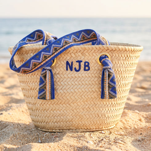 Handmade personalized Moroccan woven straw tote with blue patterned handles and custom initials 2