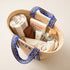 Handmade personalized Moroccan woven straw tote with blue patterned handles and custom initials 3