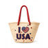 Handwoven straw beach tote with “I Love USA” embroidery and American flag heart, natural palm leaf basket with red rope handles, stylish patriotic travel and summer bag for women
