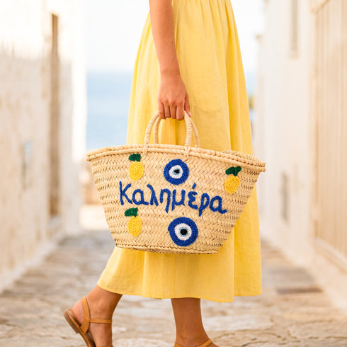 Medium Kalimera Greek straw beach bag with lemon embroidery and blue evil eye symbol, handmade Moroccan palm leaf basket tote for summer vacation and Mediterranean resort style
