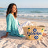 Medium Kalimera Greek straw beach bag with lemon embroidery and blue evil eye symbol, handmade Moroccan palm leaf basket tote for summer vacation and Mediterranean resort style