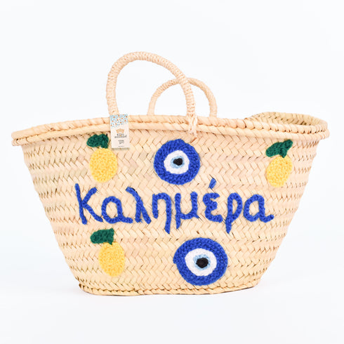 Medium Kalimera Greek straw beach bag with lemon embroidery and blue evil eye symbol, handmade Moroccan palm leaf basket tote for summer vacation and Mediterranean resort style