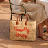 Handmade Moroccan square wicker bag with orange Pimp My Shrimp embroidery, braided brown leather handles, natural straw woven texture, artisan beach tote available in medium and large size 5