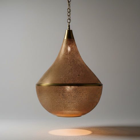 Enhance your home with the timeless allure of a Moroccan Brass Pendant Light, a stunning centerpiece that blends ancient artistry with modern home aesthetics