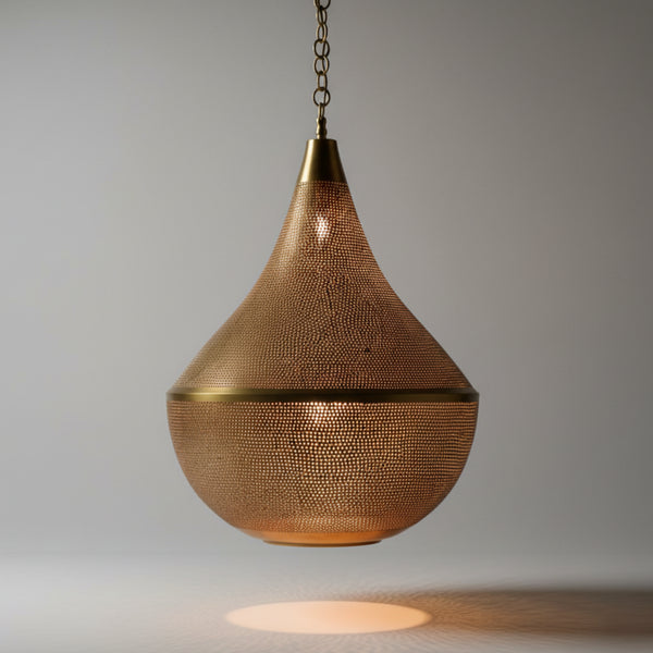 Enhance your home with the timeless allure of a Moroccan Brass Pendant Light, a stunning centerpiece that blends ancient artistry with modern home aesthetics