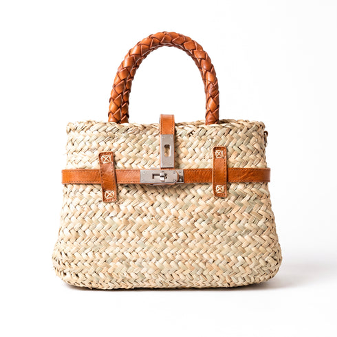 Small luxury Hermès-inspired straw handbag with braided leather handles and secure closure 1