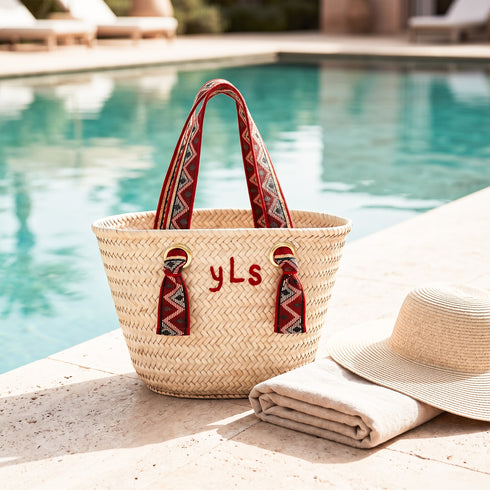 Personalized Moroccan woven straw beach tote with red Amazigh patterned handles and custom initials 2