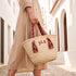 Personalized Moroccan woven straw beach tote with red Amazigh patterned handles and custom initials 6