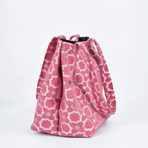 Pink Moroccan shoulder bag with traditional geometric brocade motifs ,made from durable linen with comfortable handles and lightweight design