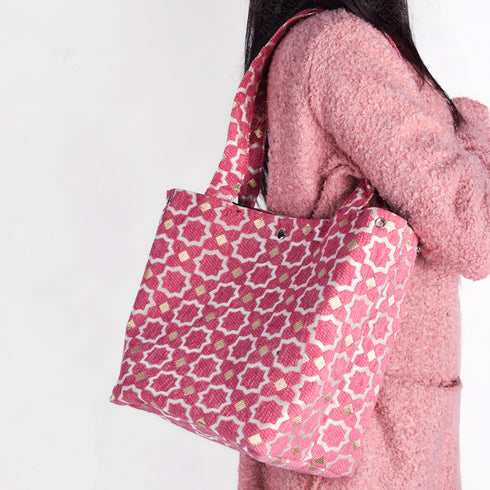 Pink Moroccan shoulder bag with traditional geometric brocade motifs ,made from durable linen with comfortable handles and lightweight design