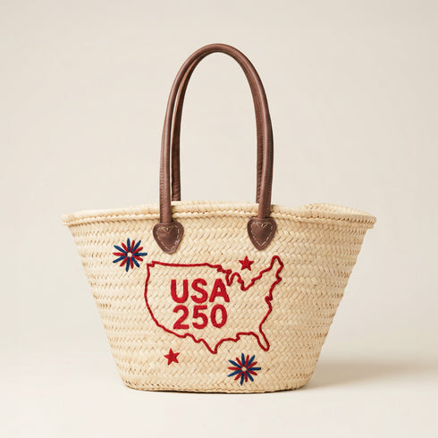 USA patriotic straw basket with red embroidered USA map and leather handles, handmade palm leaf beach tote bag for travel, summer events and 4th of July celebrations
