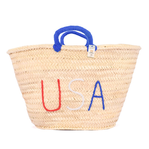 straw basket embroidered with “USA” Eco-friendly tote with blue handle—perfect for beach days, shopping, or patriotic gifts.