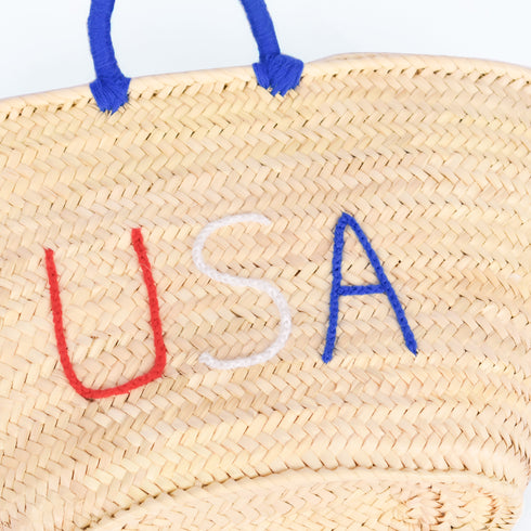 straw basket embroidered with “USA” Eco-friendly tote with blue handle—perfect for beach days, shopping, or patriotic gifts.