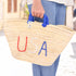 straw basket embroidered with “USA” Eco-friendly tote with blue handle—perfect for beach days, shopping, or patriotic gifts.