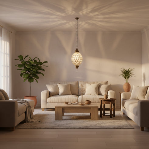 Modern living room with beige sofas, a wooden coffee table, and decorative plants.