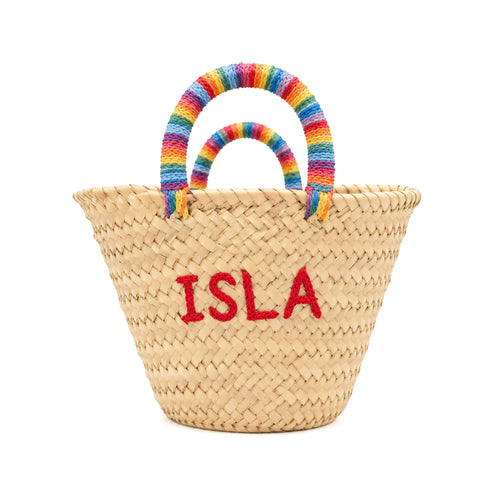 Personalized rainbow baby straw basket with custom name ISLA embroidered in red and rainbow multicolor handles