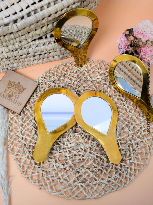 Gold Hand Mirror | Bachelorette Party Gift | Bridesmaid Mirrors - Moroccan Handmade Gifts Ideas For Women These handheld Brass mirrors make pretty gifts for bridesmaids, gifts for mom or any woman in your bridal shower and bachelorette party. Bridesmaids and maid of honors can pop these gold mirror in their purses or make bags for daily touch-ups also make a wonderful addition to any cosmetic artist's toolkit.