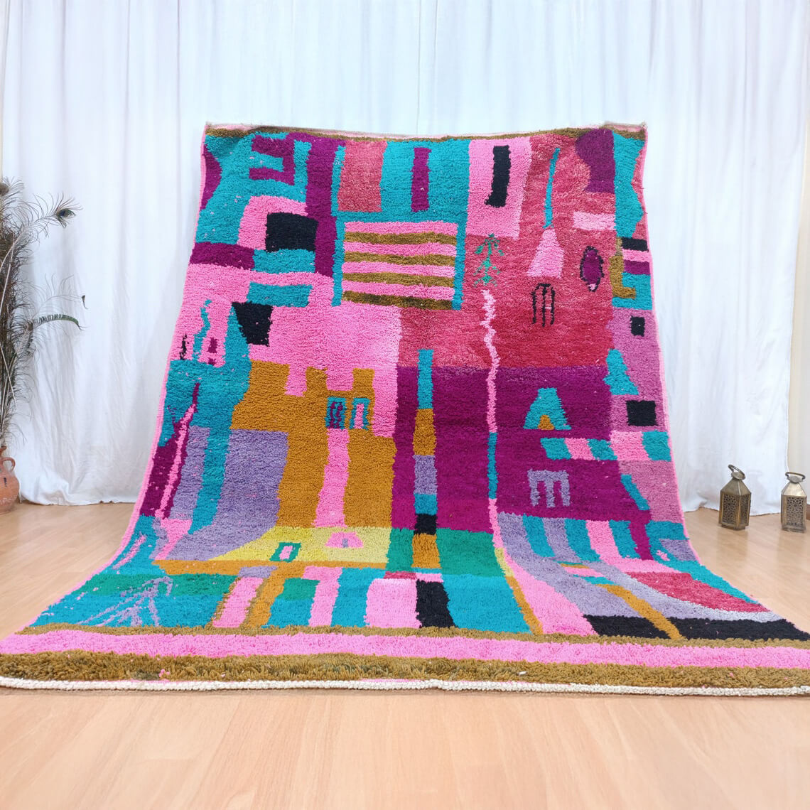 Artistic, colorful, handmade Moroccan rug featuring vibrant patterns and textures.