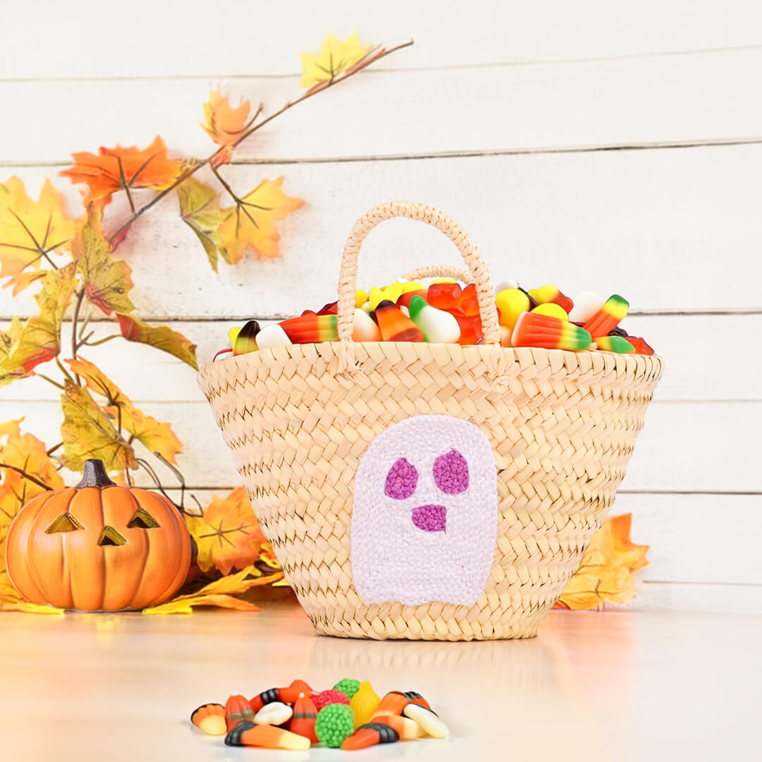 Personalized straw basket with your child's name for Halloween.