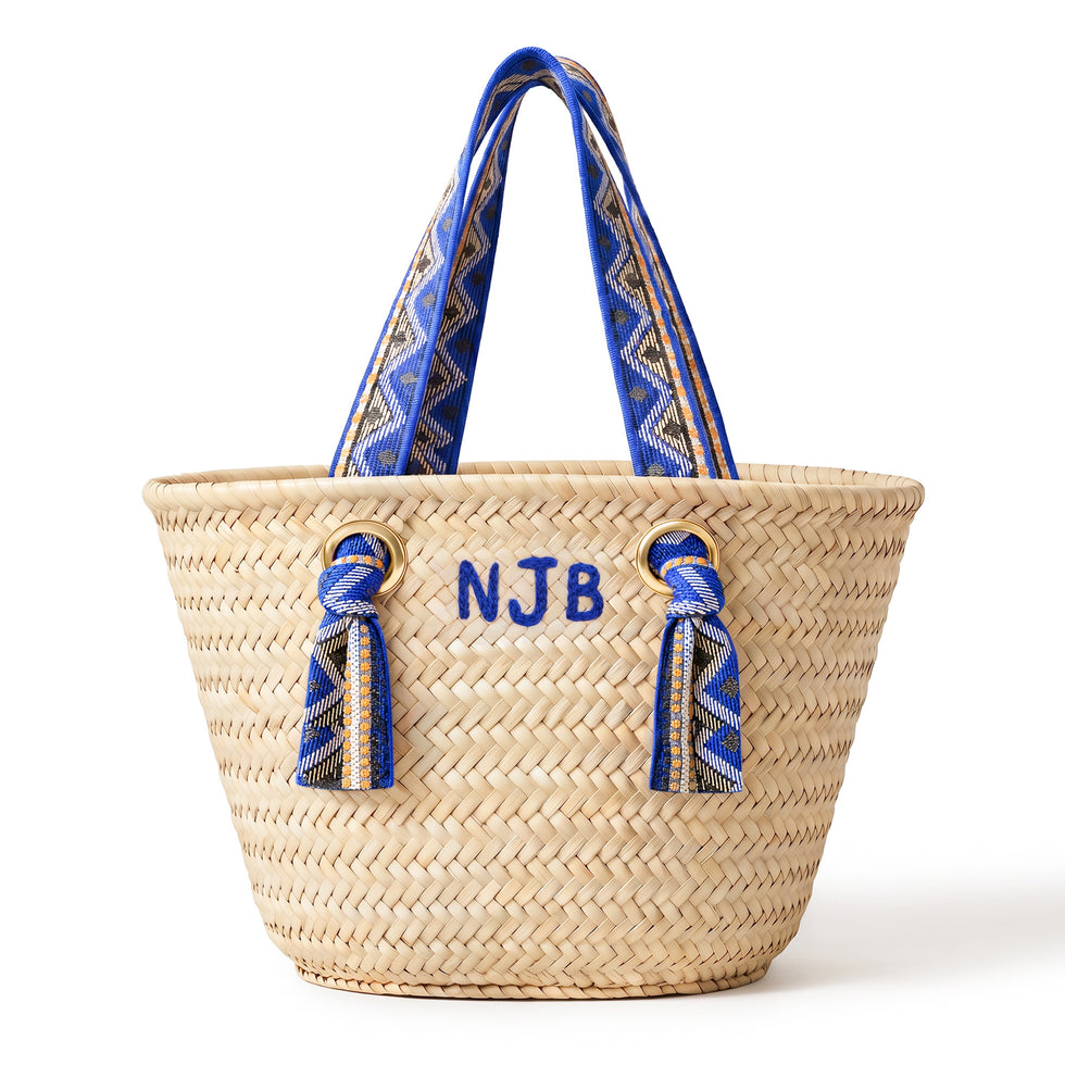 Handmade personalized Moroccan woven straw tote with blue patterned handles and custom initials 1