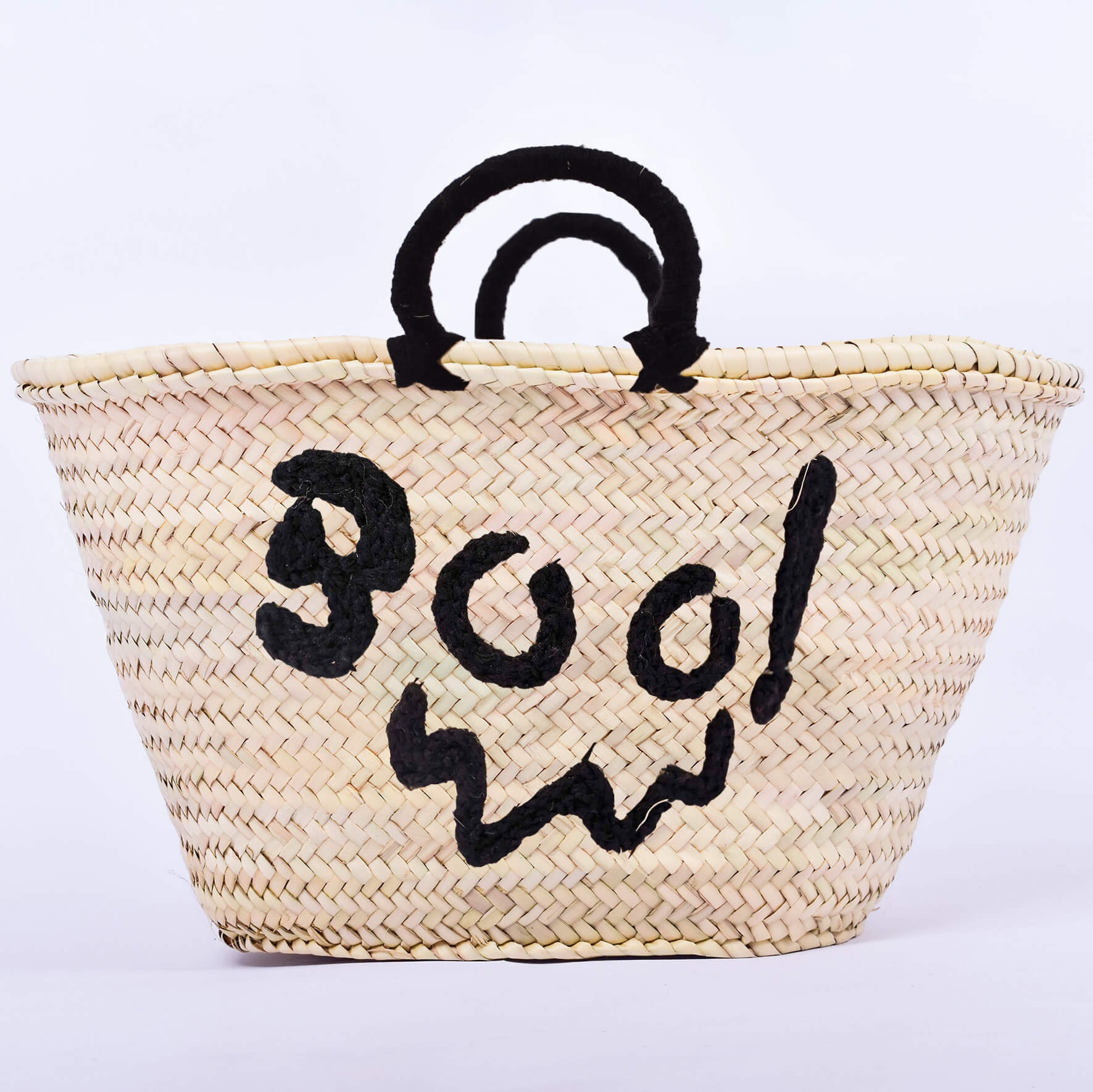 Personalized straw basket with your child's name for Halloween.