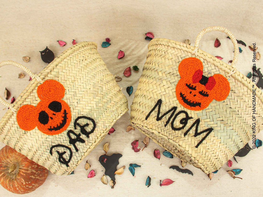 Colorful pumpkin basket filled with Halloween treats