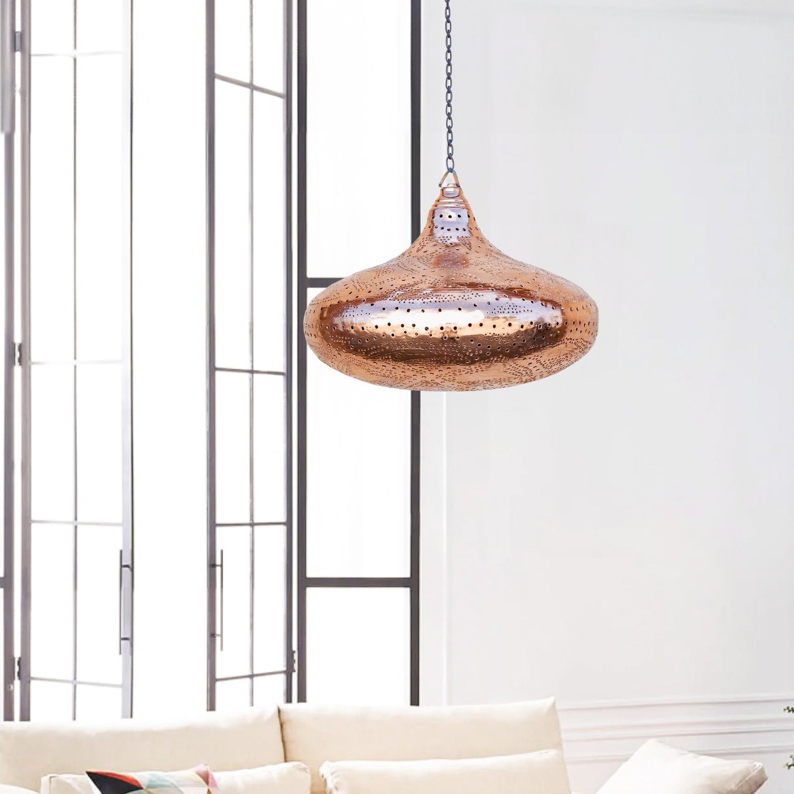 Moroccan pendant light creating a warm, inviting atmosphere in a modern living room