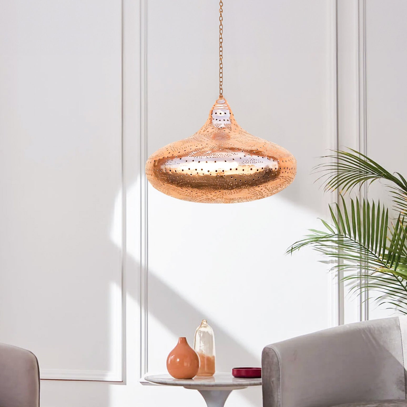 Elegant Moroccan black pendant light with intricate brass filigree design