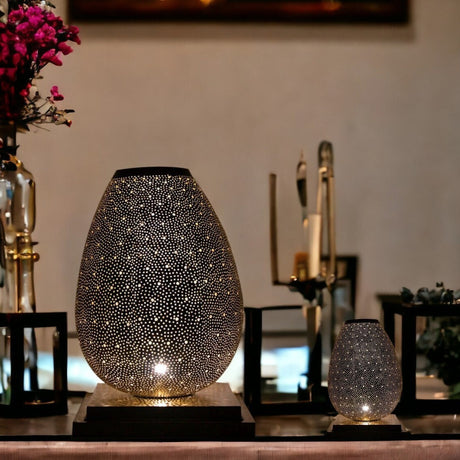 Elegant black crystal chandelier with intricate patterns and sparkling crystals