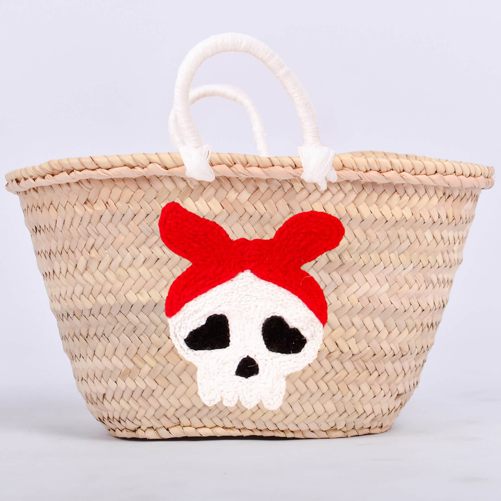 Personalized straw basket with your child's name for Halloween.