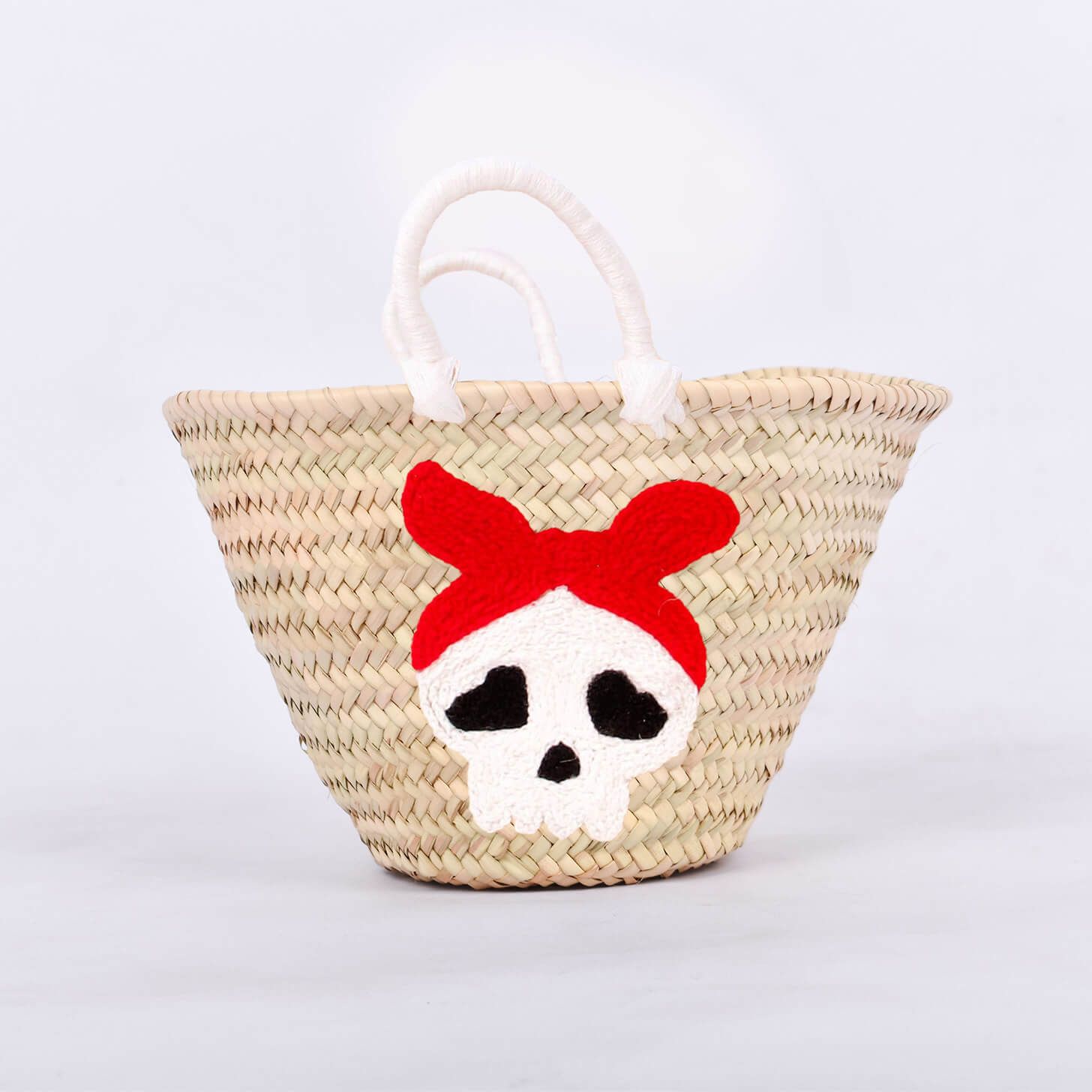 Personalized straw basket with your child's name for Halloween.