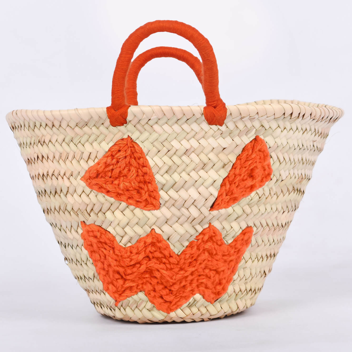 Personalized straw basket with your child's name for Halloween.