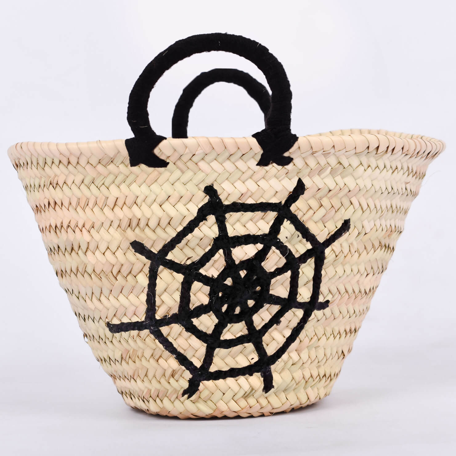 Personalized straw basket with your child's name for Halloween.