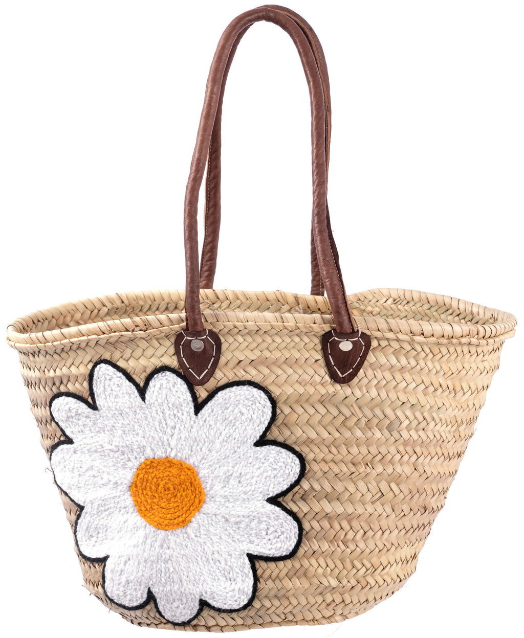 Woman carrying a personalized Moroccan straw tote bag on the beach