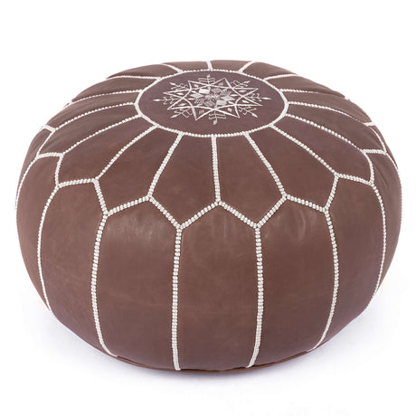 Round brown Moroccan leather pouf with intricate embroidery