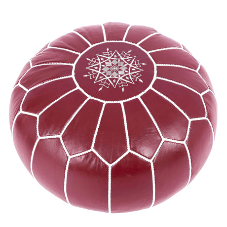 Vibrant ruby red leather pouf with intricate embroidery, perfect for adding a pop of color