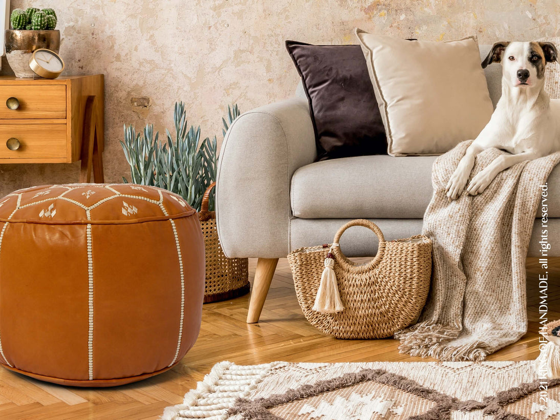 Handmade Moroccan leather pouf in dark tan, perfect for boho decor