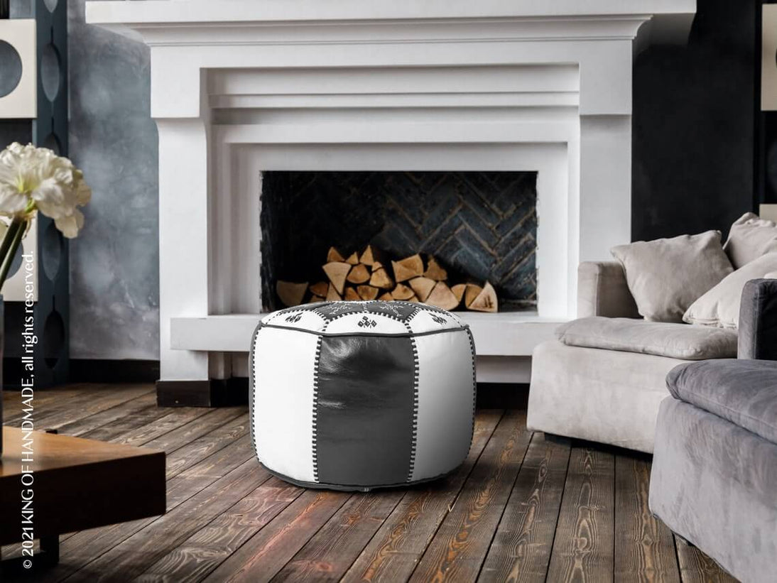 Handcrafted Moroccan ottoman pouf in black and white, perfect for modern boho interiors