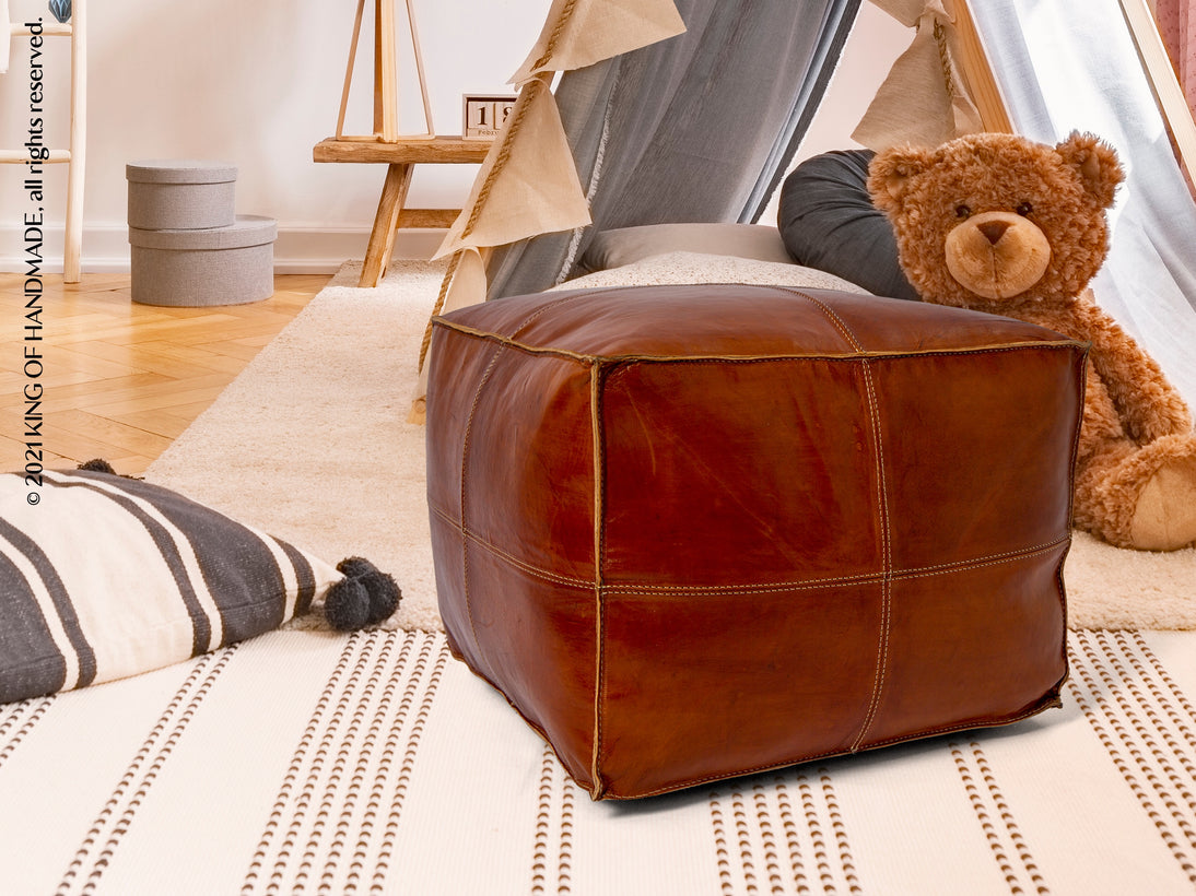 Moroccan Ottoman Pouf styled in a living room setting